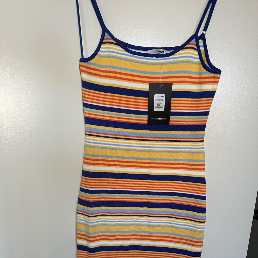 Brand New! Bodycon Maxi Dress. Size L. Tags attached never worn. Multicolor